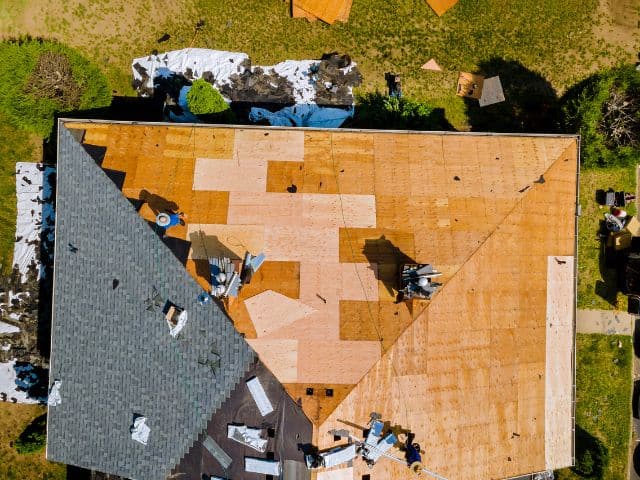roofers during tear off process